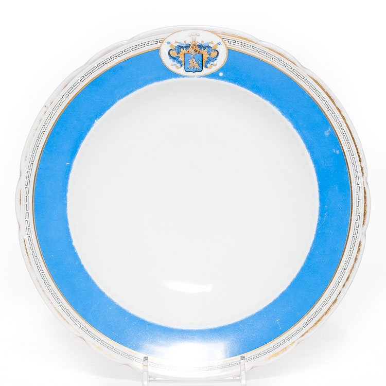 An Austrian Porcelain Armorial Plate: An Austrian porcelain armorial plate, by Fischer and Mieg, decorated with coat-of-arms of Russian Count Maslov. Manufacture's stamp in the back in paste. SIZE: Diameter 9 5/8 in. (24.5 cm)