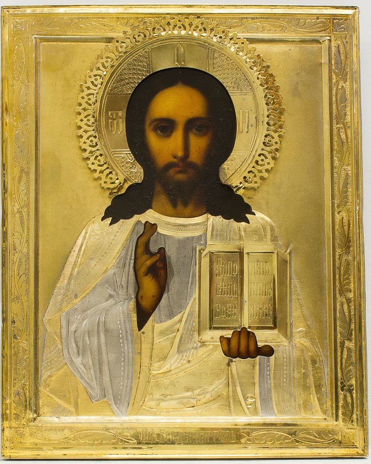 A RUSSIAN ICON OF CHRIST PANTOCRATOR: A Russian icon of Christ The Pantocrator, 19th century. Oil on wood. Silver-gilt oklad hallmarked 1899-1908, Moscow, 84 standard (875/1000 silver). SIZE: 9 x 7 1/8 in (23 x 18 cm).