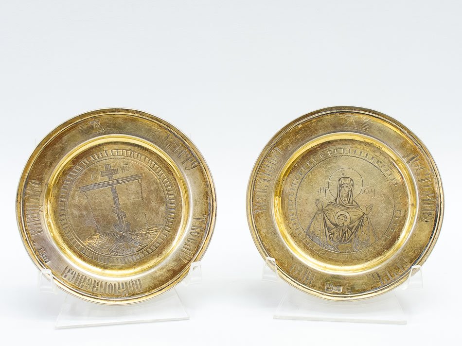 TWO RUSSIAN SILVER-GILT COMMUNION SERVICE DISHES: Two Russian Silver-Gilt communion service dishes, hallmarked. 19th century. SIZE: D 3 in (9 cm), weight 3.1 oz (87g). 1/2