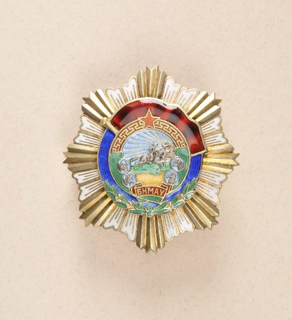 Mongolia - Order of the Red Banner of Labour type: Mongolia - Order of the Red Banner of Labour type 4 variation 2. Silver gilded and enamelled multiple parts device three times riveted on the body engraved award number 992 on screw.#BT 27 URN S. 95ff