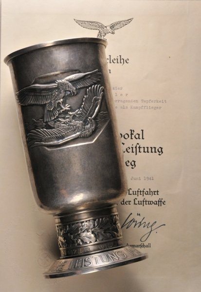 Germany (1933-1945) - Honor Goblet for exeptional deeds: Germany (1933-1945) - Honor Goblet for exeptional deeds in Aerial Warfare, with document to Unteroffizier Willi Diller. Silver, goblet with hammered appearance, motive of two fighting eagles and Iron 