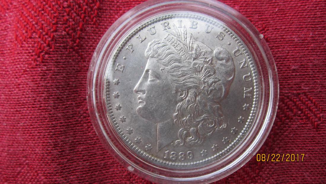 1889 MORGAN SILVER DOLLAR AU COND. IN U.S. MINT CASE (1 of 3)