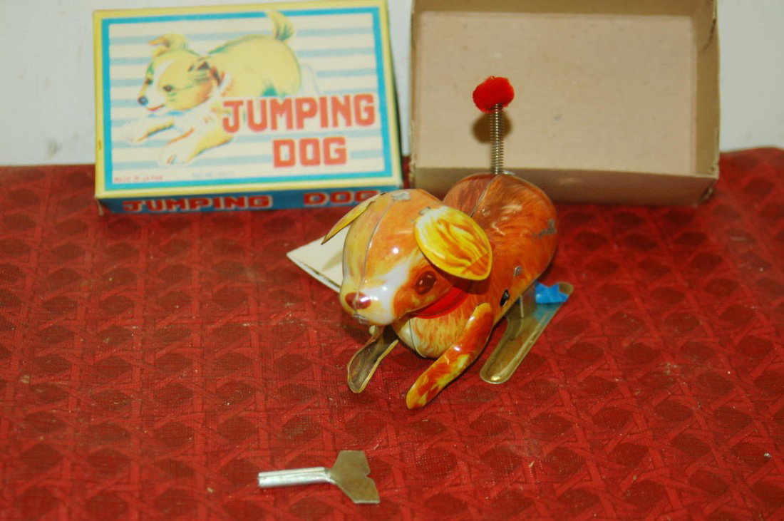 WIND UP WITH KEY JUMPING DOG: WIND UP WITH KEY JUMPING DOG