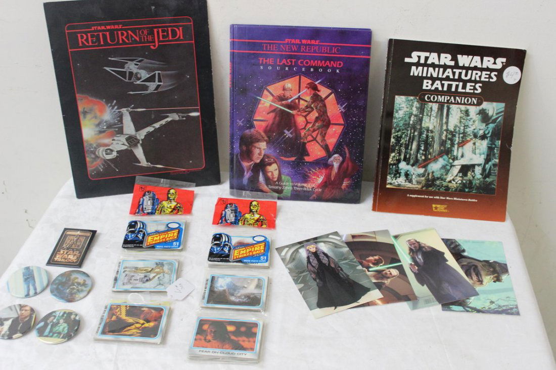 5 PINS - RETURN OF THE JEDI FOLDER - MINIATURE BAT: 5 PINS - RETURN OF THE JEDI FOLDER - MINIATURE BATTLES BOOK - THE LAST COMMAND SOURCEBOOK - 4 POSTCARDS - 2 1980'S PACKAGES OF COLLECTOR CARDS(STAR WARS) EMPIRE STRIKES BACK SEALED