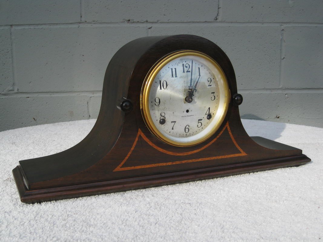 SETH THOMAS HUMP BACK MANTEL CLOCK - WORKS AND HAS: SETH THOMAS HUMP BACK MANTEL CLOCK - WORKS AND HAS KEY AND PENDULUM - UNUSUAL S&T ON HANDS