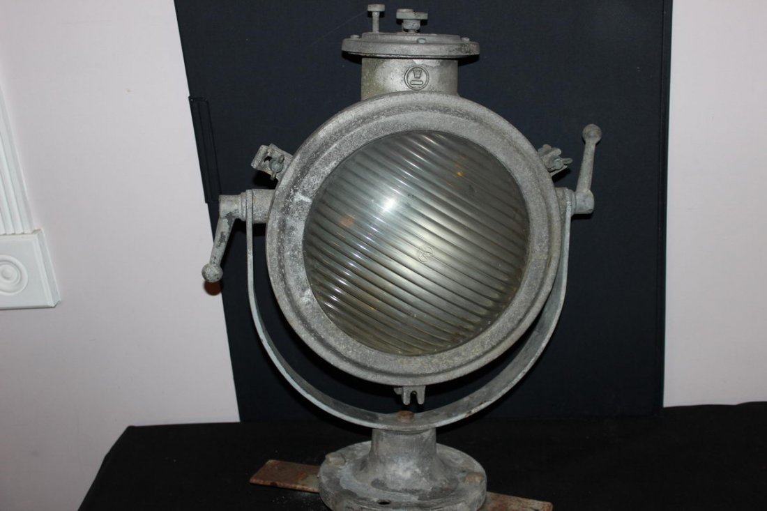 LARGE WESTINGHOUSE CHROMILITE FLOODLIGHT FOR USE ON: LARGE WESTINGHOUSE CHROMILITE FLOODLIGHT FOR USE ON OCEAN VESSELS OR LANDING LIGHT - SOLID CAST-IRON W/ ADJUSTABLE IRON CRADLE 25" HIGH 18" WIDE
