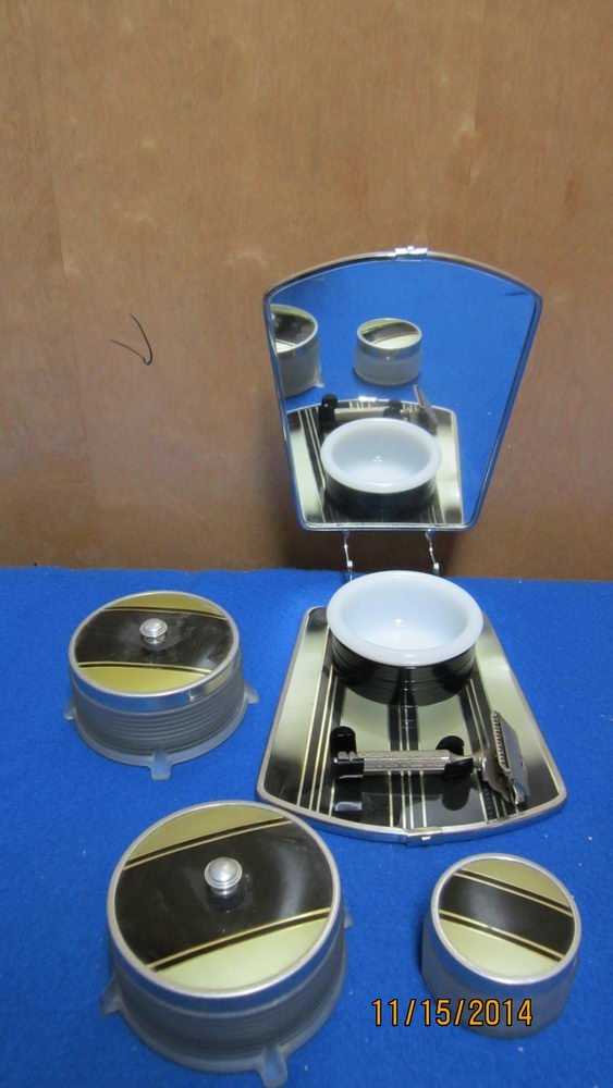 NICE DECO 4 PC. SETS TO INCLUDE FOLDING SHAVING MIRROR: NICE DECO 4 PC. SETS TO INCLUDE FOLDING SHAVING MIRROR WITH RAZOR AND MILK GLASS INSERTS AND 3 FROSTED GLASS SIDE JARS - EXCELLENT CONDITION ALL ONE WAY