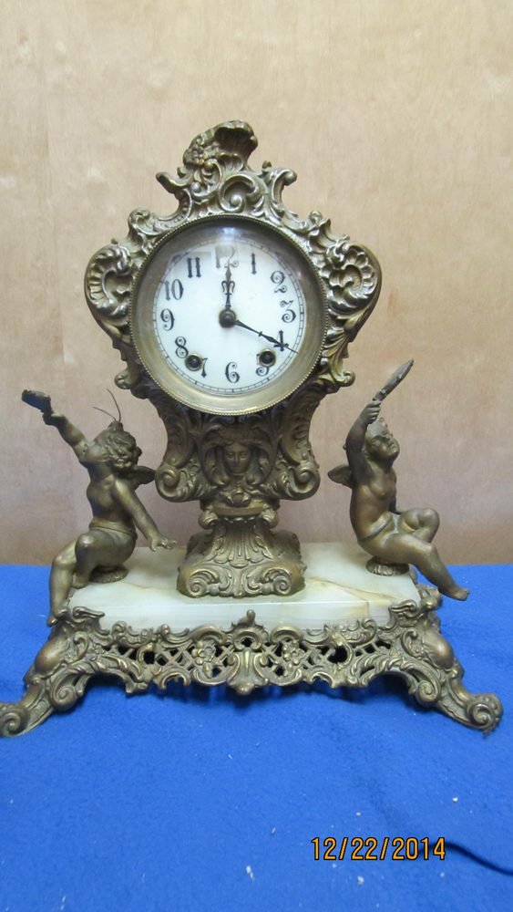 GREAT FRENCH STYLE 1890'S FIGURAL CLOCK - MADE BY: GREAT FRENCH STYLE 1890'S FIGURAL CLOCK - MADE BY GILBERT CLOCK CO. - WINSTED CONN. - BRASS & ALABASTOR - CRYSTAL DOOR NEEDS TO BE RETACKED - CLOCK STANDS 14" TALL & 12" WIDE