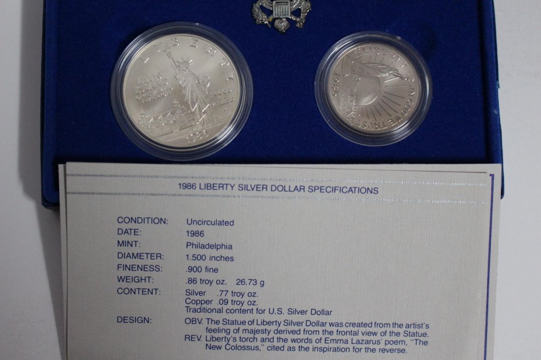 1986 US LIBERTY COMMEMORATIVE COINS – SILVER DOLLAR: 1986 US LIBERTY COMMEMORATIVE COINS – SILVER DOLLAR FEATURES STATUE OF LIBERTY 90% SILVER .77 TROY OUNCE .999 SILVER - HALF-DOLLAR FEATURES NEW YORK SKYLINE W/STATUE OF LIBERTY, COPPER/NICKEL – CO