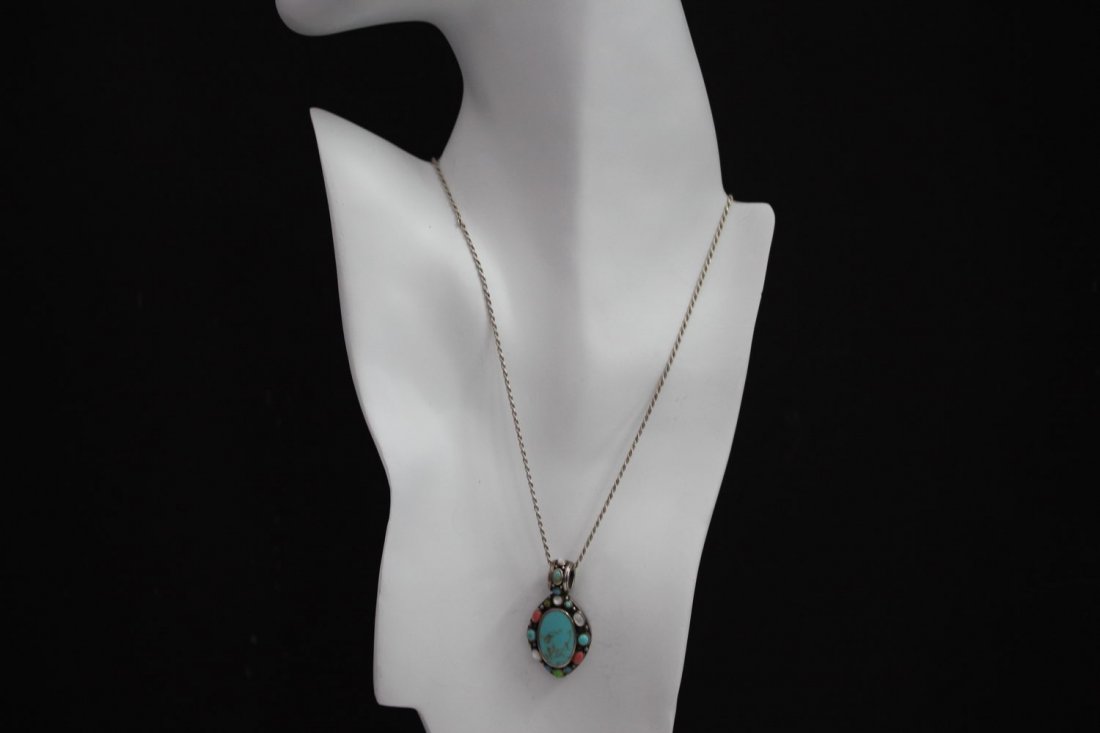 STERLING SILVER MULTI STONE PENDANT AND THE NECKLACE: STERLING SILVER MULTI STONE PENDANT AND THE NECKLACE FEATURES TURQUOISE- CORAL- JADE- MOONSTONE- NECKLACE 20" LONG