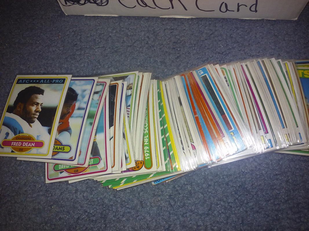Three row box loaded with vintage football cards many: Three row box loaded with vintage football cards many rookies inserts and also 70s and 80s