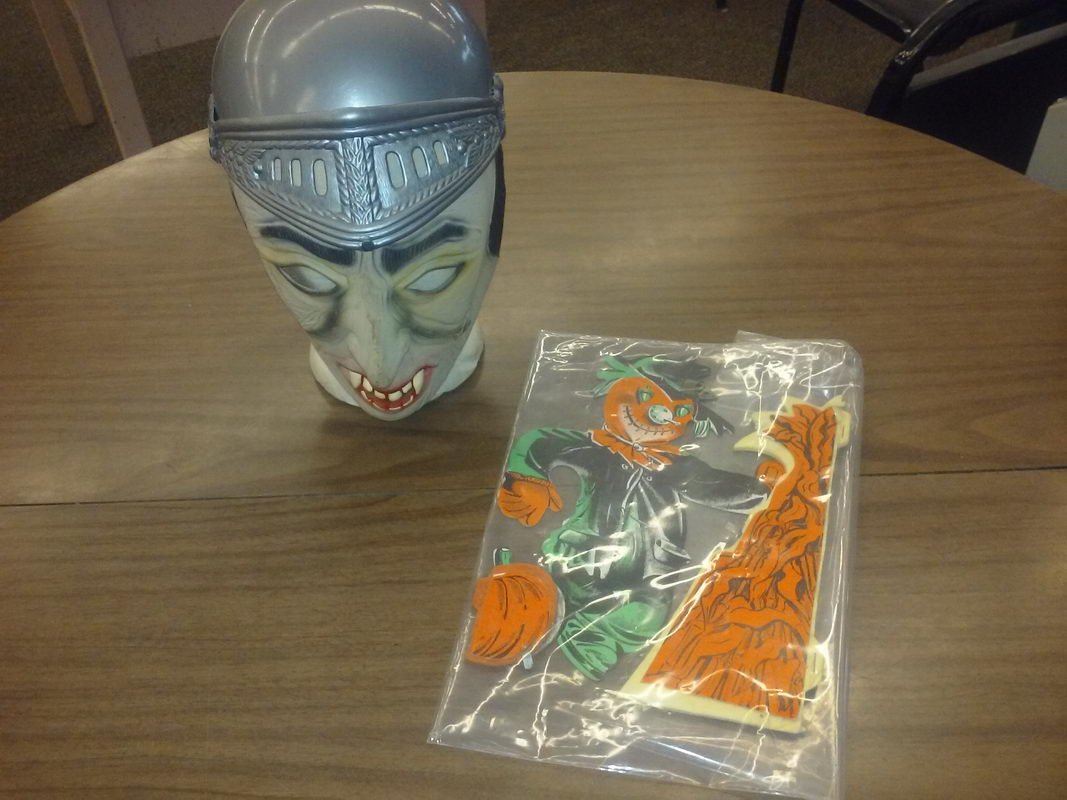 Vintage Halloween decoration and mask of unknown: Vintage Halloween decoration and mask of unknown character
