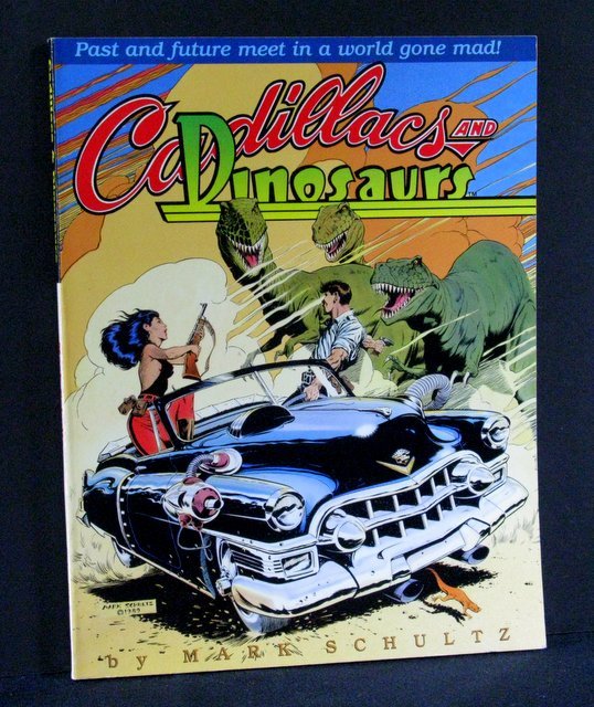 CADILLACS AND DINOSAURS DELUXE GRAPHIC NOVEL Kitchen: CADILLACS AND DINOSAURS DELUXE GRAPHIC NOVEL Kitchen Sink Press fourth printing, 1992. 136 page 8 1/2" x 11" graphic novel with color cover, black & white interior. Near Mint.