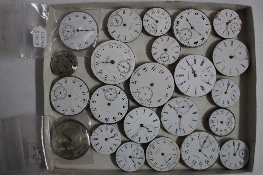 LOT OF 50 VINTAGE WATCH MOVEMENTS INCLUDES 23 POCKET: LOT OF 50 VINTAGE WATCH MOVEMENTS INCLUDES 23 POCKET WATCH MOVEMENTS (ELGIN, AMERICAN WALTHAM, EMPERIAL, JULES HUGUENIN WALTHAM, LOUIS MATILE LOCLE) - 27 WRISTWATCH MOVEMENTS (BULOVA, ELGIN, GRUEN, WE