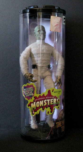 THE MUMMY'S TOMB 12" FIGURE - Hasbro Toys, 1999 - New: THE MUMMY'S TOMB 12" FIGURE - Hasbro Toys, 1999 - New in colorful tube package with display base and stand.