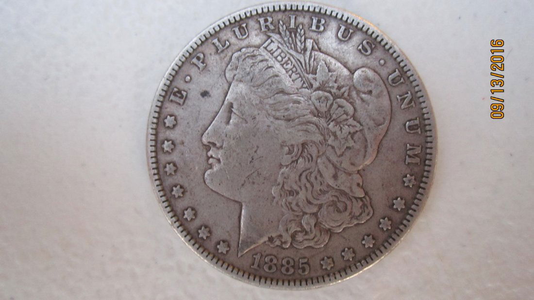 1885 U.S. MORGAN SILVER DOLLAR  - EXC. COND (1 of 3)
