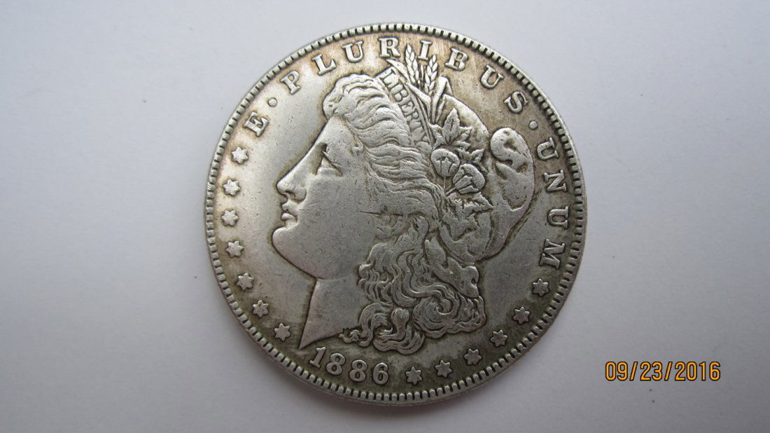 NICE 1886 U.S. MORGAN SILVER DOLLAR - GREAT COND. (1 of 3)