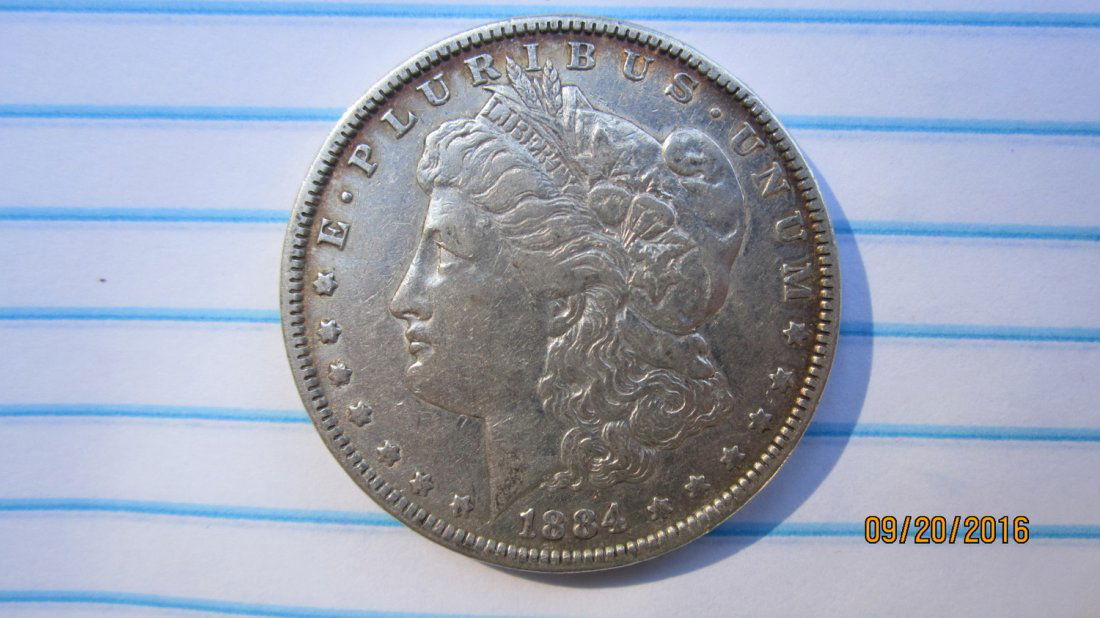 HIGH GRADE 1884 U.S. MORGAN SILVER DOLLAR (1 of 3)
