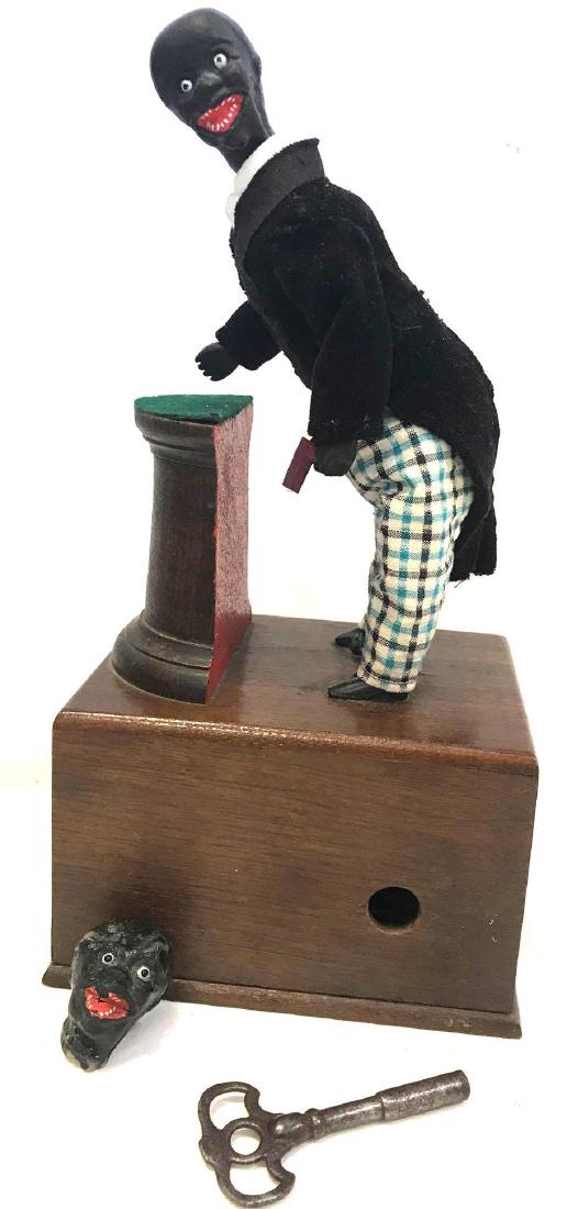 Early American Ives Clockwork Preacher Toy:  Early American Ives Clockwork Preacher Toy: includes scarce original wooden box. Which says, "The Negro Preacher". Late 19th century. Stenciled wooden box with preacher not original clothing. Ho