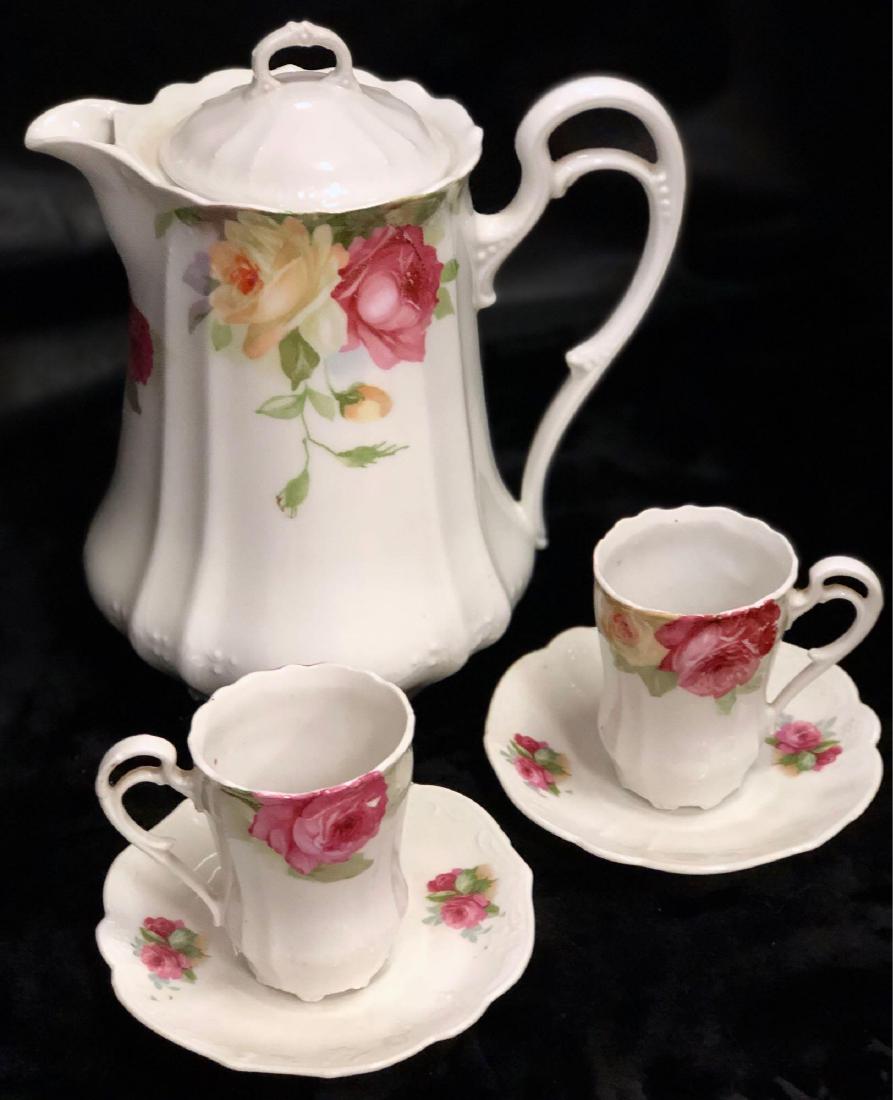 Vintage English Hot Chocolate Set: Vintage English Hot Chocolate Set. To Include One Tea Pot, Two Cups, and Two Saucers. In Good Condition, With Beautiful Floral Designs. Tea Pot Measures 9" in Height, Tea Cups Measure 3" in Height, an