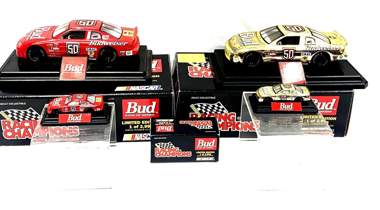 Collection of Bud 'King of Beers' Novelties: Collection of Bud 'King of Beers' Nascar Toys. To Include One (1) 1998 Ricky Craven Budweiser 'King of Beers' Mounted Mini Toy Stock Car and Two (2) 1998 Limited Edition Bud 'King of Beers' Raci