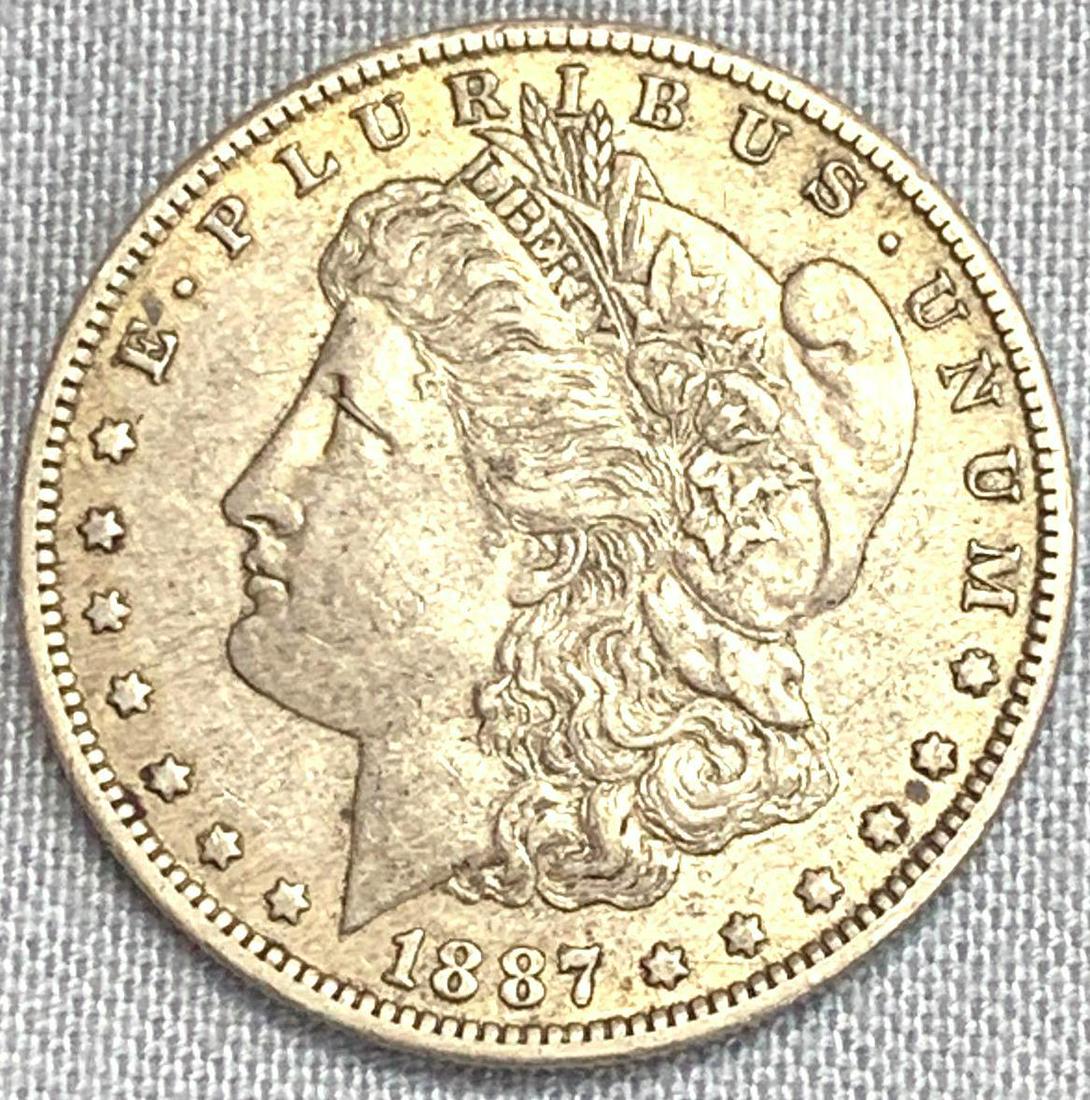 One 1887-O Morgan Silver Dollar (1 of 2)