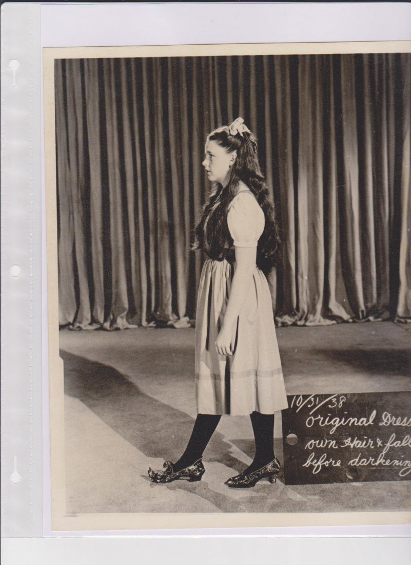 Collection of 8x10 Black & White Photos of Judy Ga: Collection of 8x10 Black & White Photos of Judy Garland dressed as Dorothy from The Wizard of Oz, one photo Dorothy with the Tin Man, Scarecrow, Cowardly Lion and Wizard; 1 Photo of Dorothy with The M