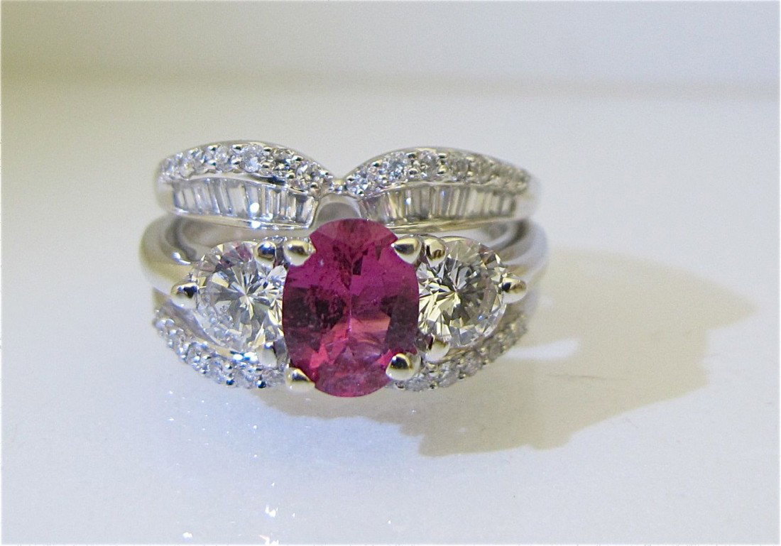 18KWG Pink Ruby & Diamond Ring Containing 1 Oval P: 18KWG Pink Ruby & Diamond Ring Containing 1 Oval Pink Ruby=2.50cts., 2Dia=1ct., F/G, SI1. 14KWG Diamond Frame Containing 32Br=.50cts., 36Bag=1.50cts.