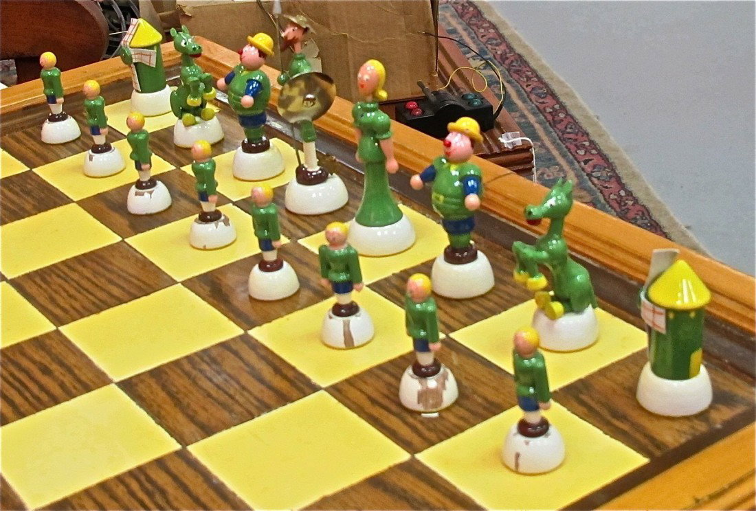 Marquetry Inlaid Chess Board Table with Carved Fig: Marquetry Inlaid Chess Board Table with Painted Figural Chess Pieces