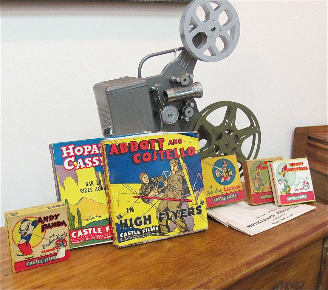 Vintage Movie Graph Projector, Model #E-946 with 6: Vintage Movie Graph Projector, Model #E-946 with 6 Movies to Include: Abbott & Costello in :"High Flyers", Hopalong Cassidy Bar 20 Rides Again, Woody Woodpecker "The Giant Killer", Andy Panda "Fish Fr