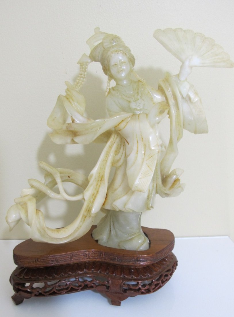 Jade Quan Yin Figurine: Jade Quan Yin Figurine, there has been an old repair, not obvious to the eye, to the fan.