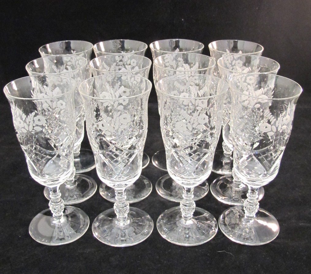 12 Etched Crystal Champagne Glasses, 12 Etched Crystal: 12 Etched Crystal Champagne Glasses, 12 Etched Crystal Wine/Water Goblets, 10 Etched Crystal Cordials and 12 Etched Crystal Parfaits