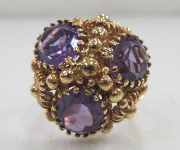 14K Yellow Gold Amythest Ring Containing 3 Oval Cut Amy: 14K Yellow Gold Amythest Ring Containing 3 Oval Cut Amy= approx. 8.25cts.