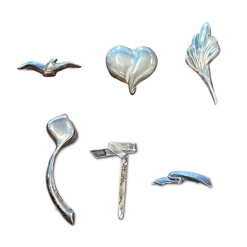 Collection of Sterling Silver Brooches: Collection of Sterling Silver Brooches. This collection of six sterling silver brooches has a combined weight of approximately 3.5 troy ounces. The first is a Bayanihan “925” sterling silv