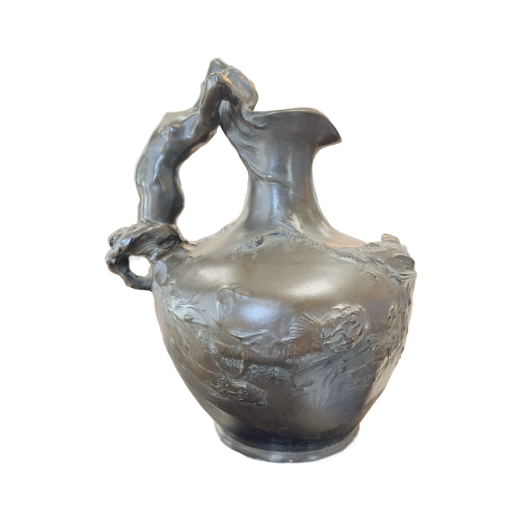 Auguste Ledru (1860 - 1902) Bronze Figural Ewer: Auguste Ledru (1860 - 1902) Bronze Figural Ewer, Bronze w/ Shaded Brown Patina. Foundry Mark: Susse Freres Paris France. Measures 13 1/2" in height, approx. 11" in diameter with a 5 1/4" base.