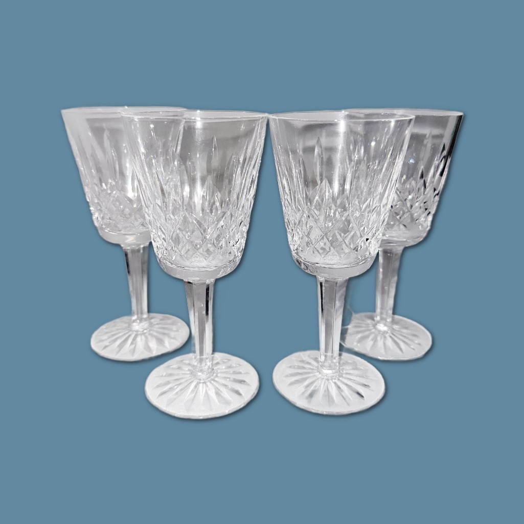 Collection of Waterford Crystal Lismore Claret Glasses: Collection of Waterford Crystal Lismore Claret Glasses. This Lot Includes Four (4) Claret Glasses in Excellent Condition. The Glasses Measure Approximately 5.5" in Height and 2.5" in Diameter. 