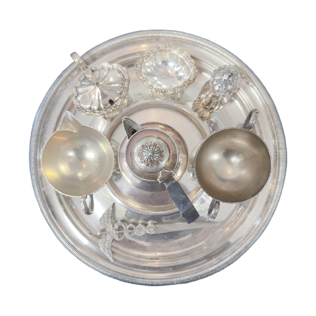 Large Collection of Silver Plated Items: Round Tray (14 1/2" diameter), Sugar & Creamer (Both are 3 3/4" in diameter & 2 1/2" in height), Small Teapot ( 6" in height ),Footed Salt Shaker (3 3/4" in height), Footed Open Salt & Footed Open