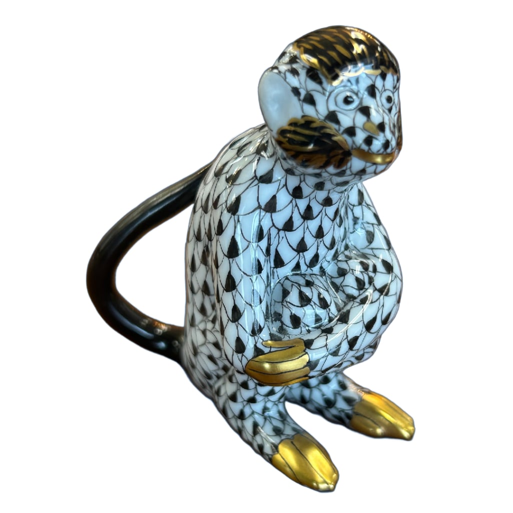 Herend Fishnet Pattern Monkey Figurine: Herend Fishnet Pattern Monkey Figurine. This Lot Includes One (1) Herend Black Fishnet Pattern Monkey Figurine with 24kt Gold Details. This Figurine is in Very Good Condition and Measures