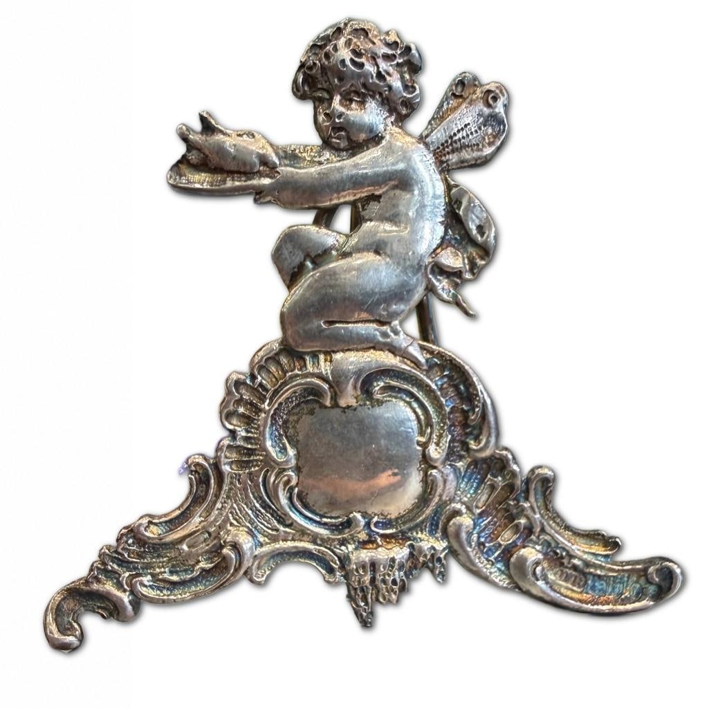 AntiqueLate Victorian Period Sterling Silver Cherub Place Card Holder: Antique Late Victorian Period Sterling Silver Cherub Place Card Holder 1867-1904 DB Stamp Denoting David Bridge London. The Holder Weighs 19.40dwt in Pennyweight and Measures 2.5 inches in Height and 