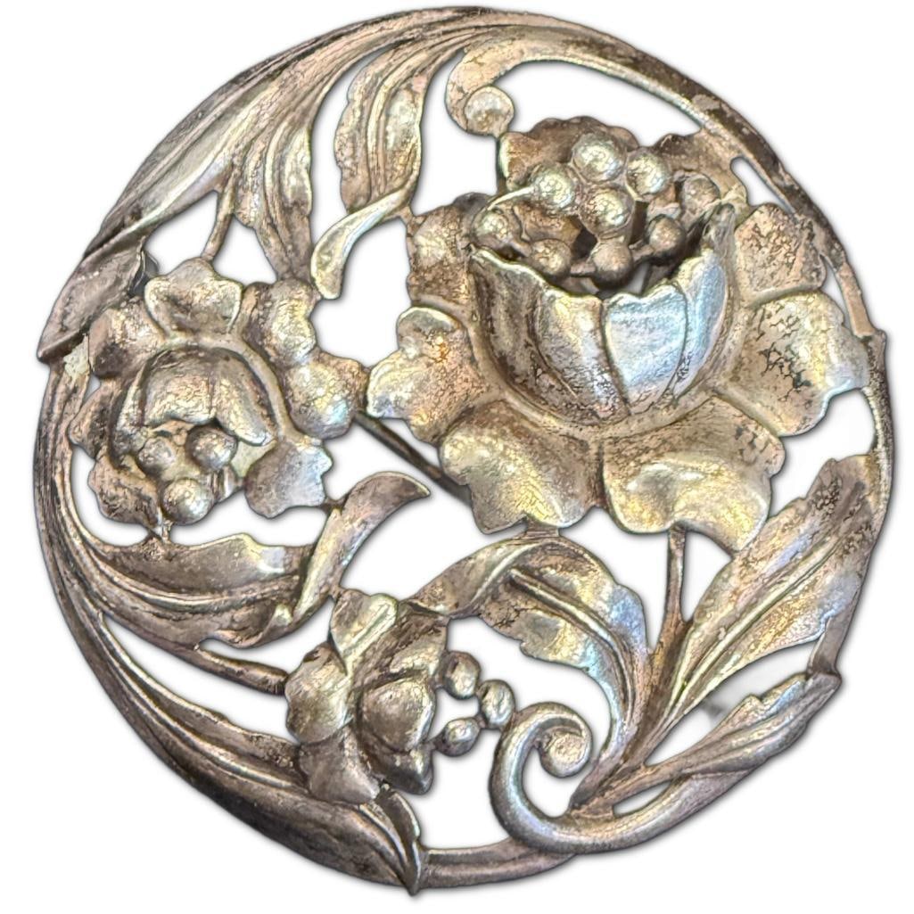 Art Nouveau Sterling Brooch: Art Nouveau Sterling Brooch Dane Craft Sterling Measuring 2.25 inches in Diameter. The Brooch Weighs 16.04dwt in Pennyweight.