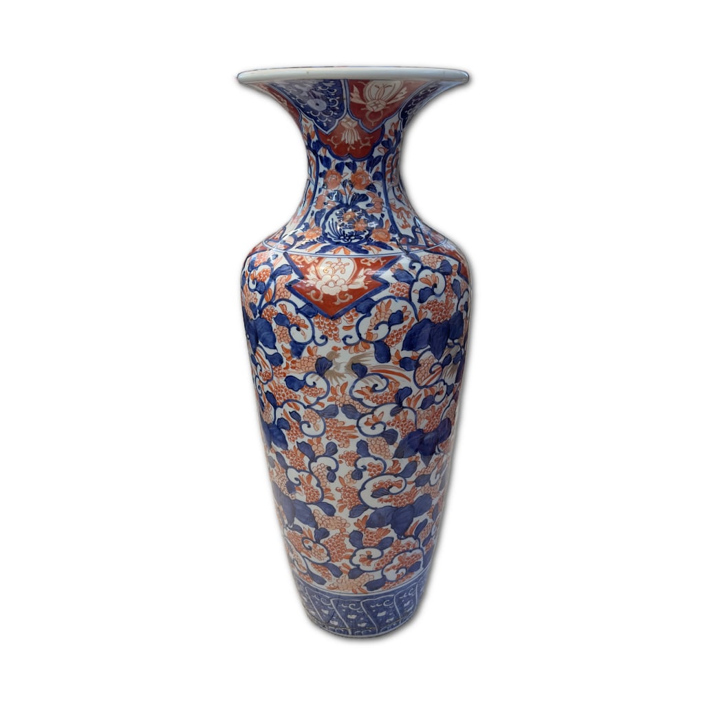 Large Imari Porcelain Floor Vase: Large Imari Porcelain Floor Vase. This large Imari porcelain floor vase features a traditional baluster form with a prominent flared rim, decorated in a classic palette of rich underglaze cobalt blue,