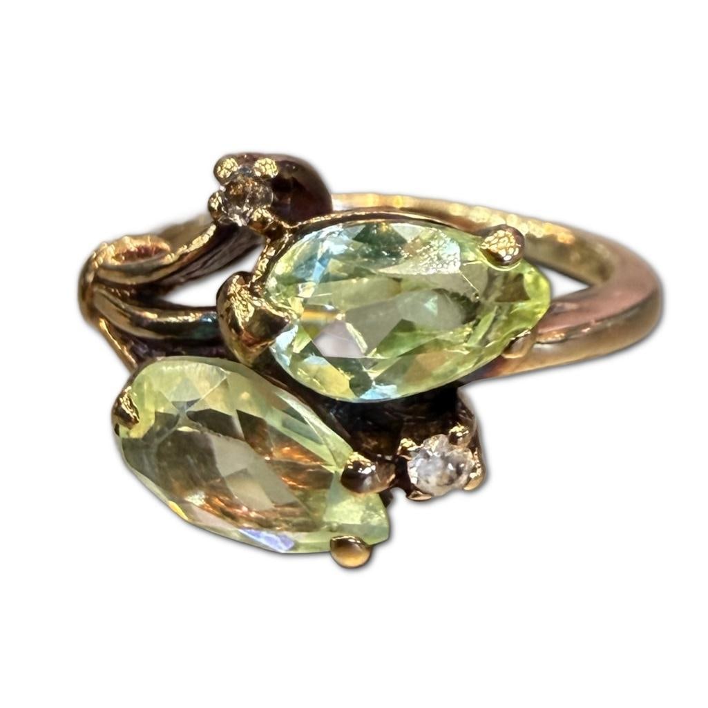 10k Yellow Gold Lemon Quartz Twin Stone Ring: 10k Yellow Gold Lemon Quartz Twin Stone Ring Containing Two (2) Lemon Quartz Weighing Approximately 2cts in Total Carat Weight. The Rings Also Contains Two Small Clear Quartz Weighing Approximately .1