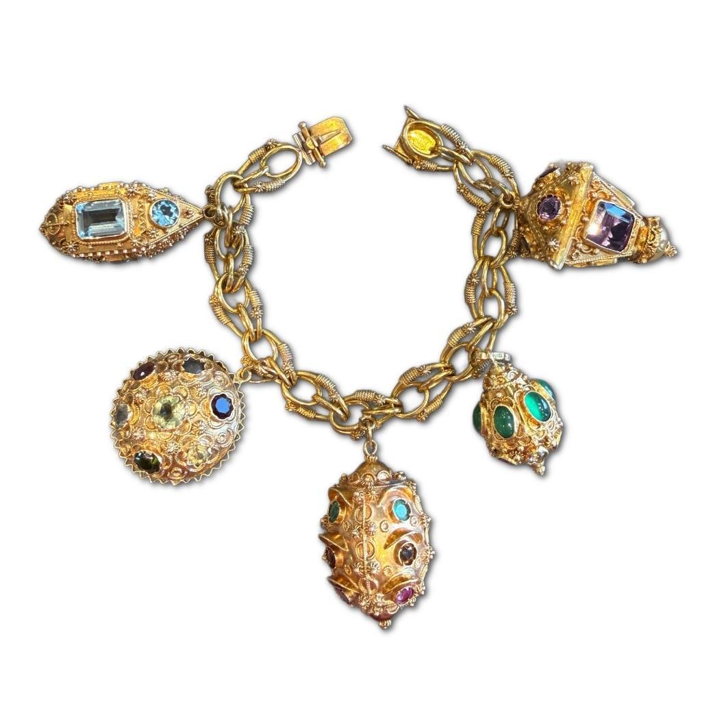 18k YG Etruscan Revival Charm Bracelet: 18k Yellow Gold Etruscan Revival Charm Bracelet Featuring Five (5) Italian Lantern Charms. The Charms Feature Emeralds, Sapphire, Amethyst, Aquamarine, Peridot, Citrine, Lemon Quartz, Pink Tourmaline,