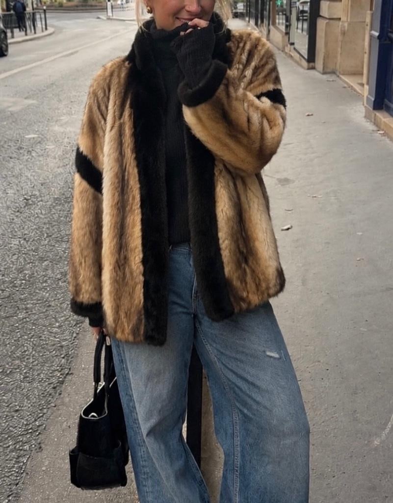 Vintage Mink and Fitch Coat: Vintage Mink and Fitch Coat. This lot includes one (1) vintage mid-length coat crafted from a striking combination of mink and fitch fur, offered in excellent vintage condition. Measuring
