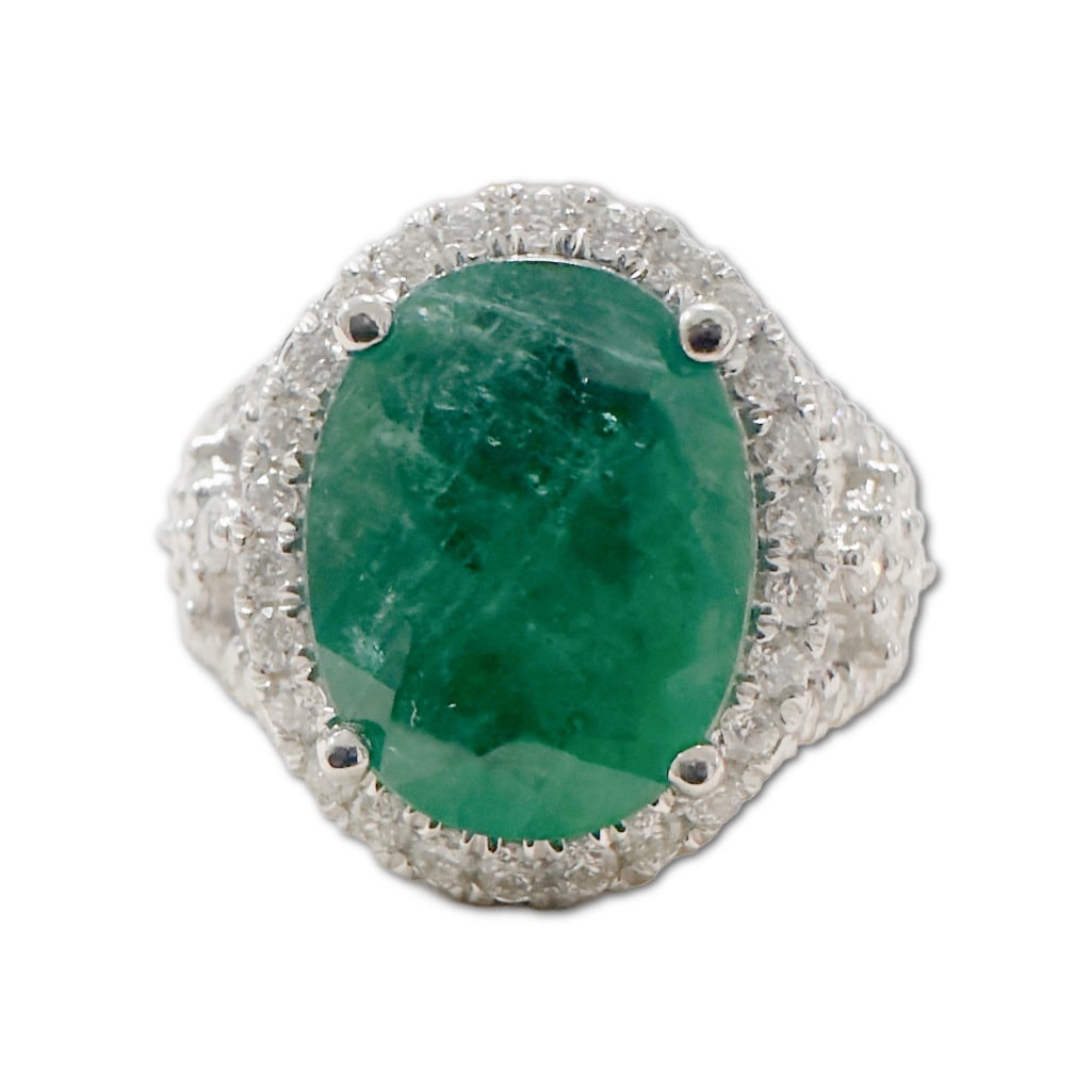 Oscar Friedman Platinum Minor Oil Emerald & Diamond Ring: Oscar Friedman Platinum Minor Oil Emerald & Diamond Ring. This Ring Includes One (1) Natural Beryl Oval Brilliant Cut Crown Modified Brilliant Cut Pavilion Emerald (11.89 x 9.14 x 4.65mm), Weighing
