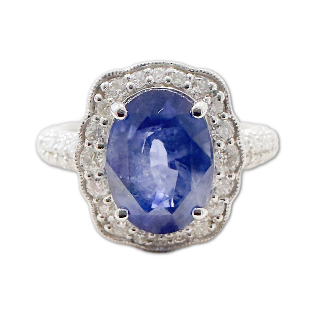 Offo Gofflieb Platinum & Sapphire Ring: Offo Gofflieb Platinum & Sapphire Ring. This Ring Includes One (1) Oval Modified Brilliant Cut Crown Modified Step Cut Pavilion Natural Corundum Sapphire (9.52 x 7.09 x 5.31mm), Weighing 3.11 Carats.