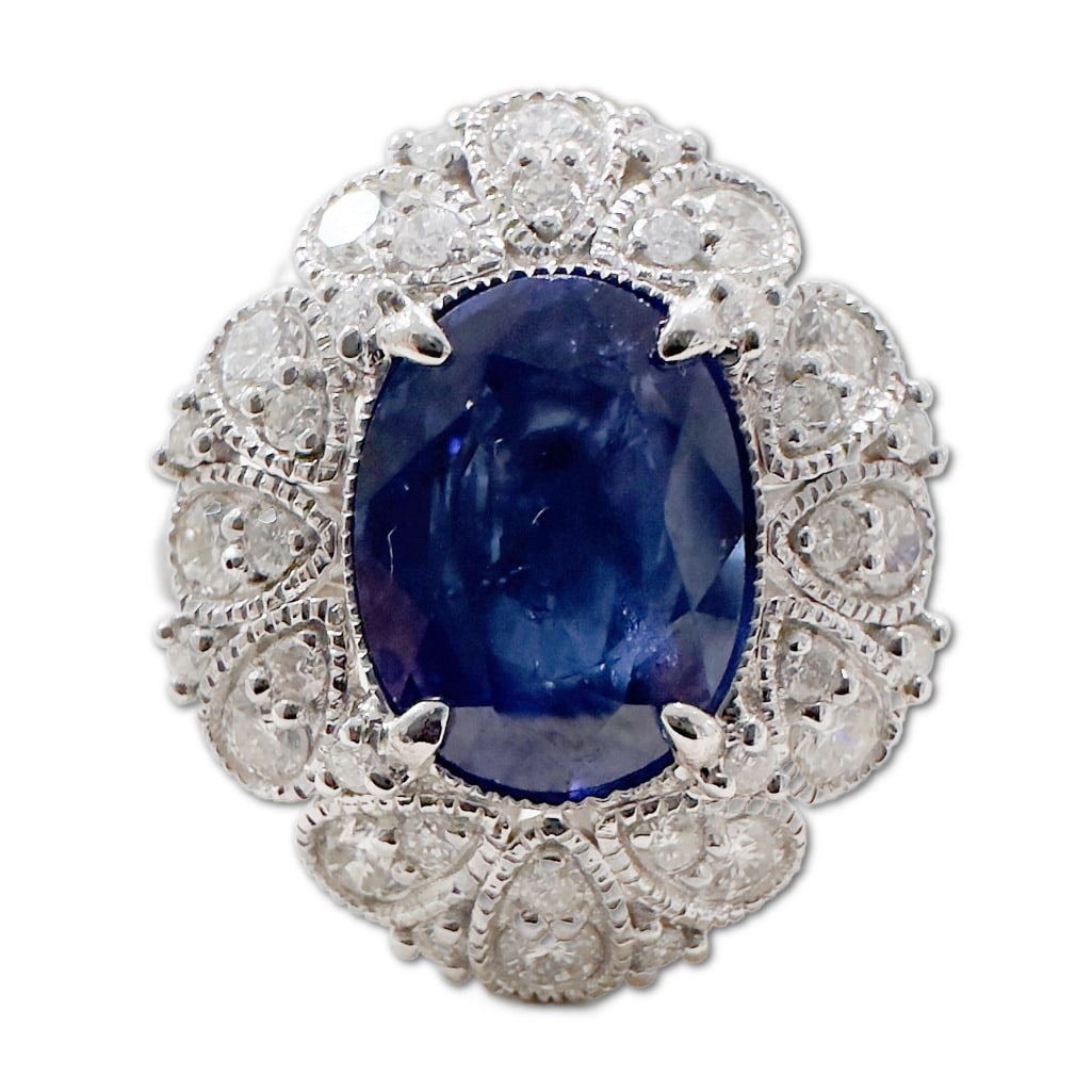 14K White Gold Sri Lanka Blue Sapphire & Diamond Ring: 14K White Gold Sri Lanka Blue Sapphire & Diamond Ring. This Ring Includes One (1) Oval Brilliant Faceted Cut Natural Sri Lanka Sapphire Corundum (9.70 x 7.40mm), Weighing 2.7 Carats. This Sapphire