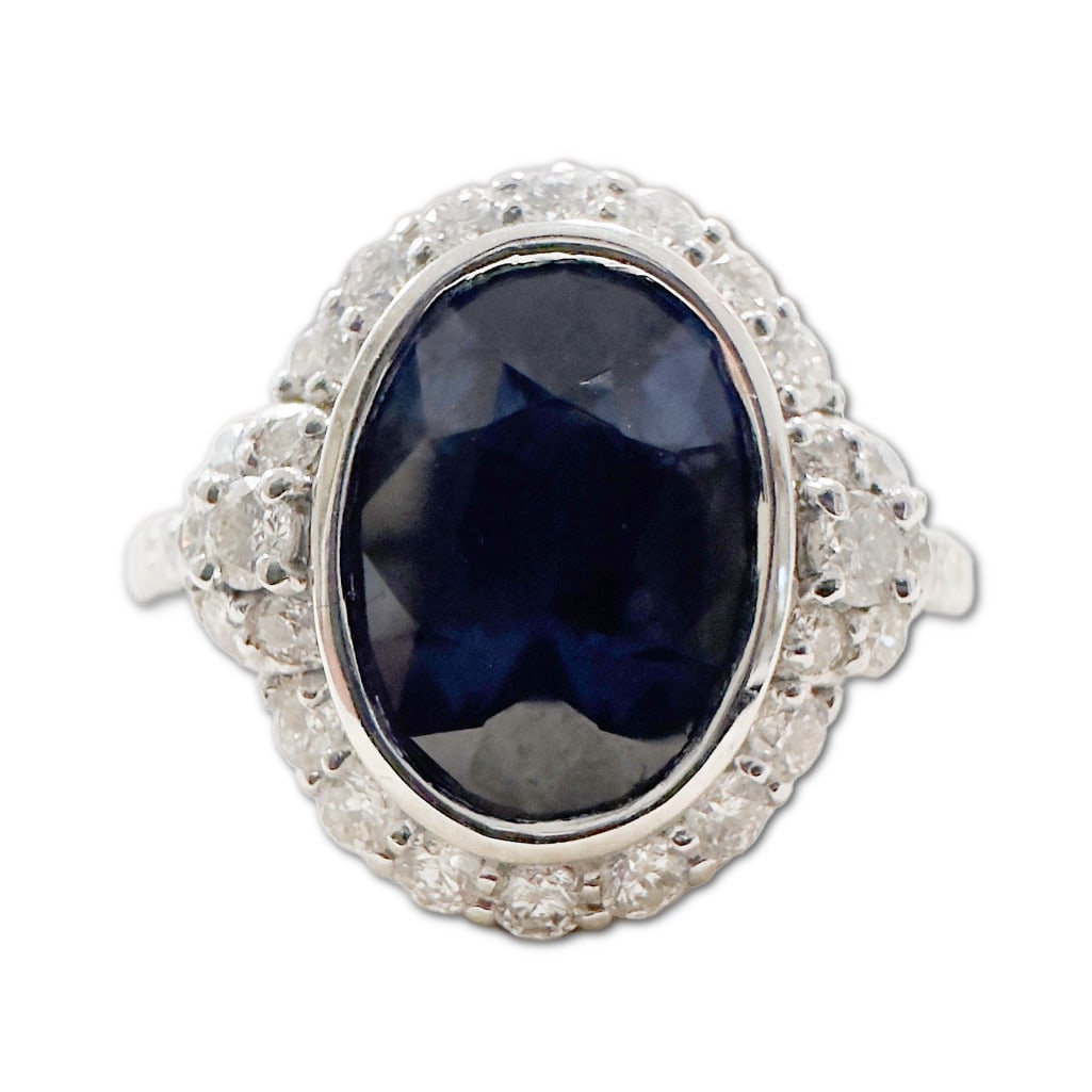 Oscar Friedman Platinum Spinel & Diamond Ring: Oscar Friedman Platinum Spinel & Diamond Ring. This Ring Includes One (1) Oval Brilliant Cut Crown Natural No Heat Spinel (9.65 x 6.96 x 4.73mm), Weighing 2.22 Carats. This Spinel has a Blue Color.