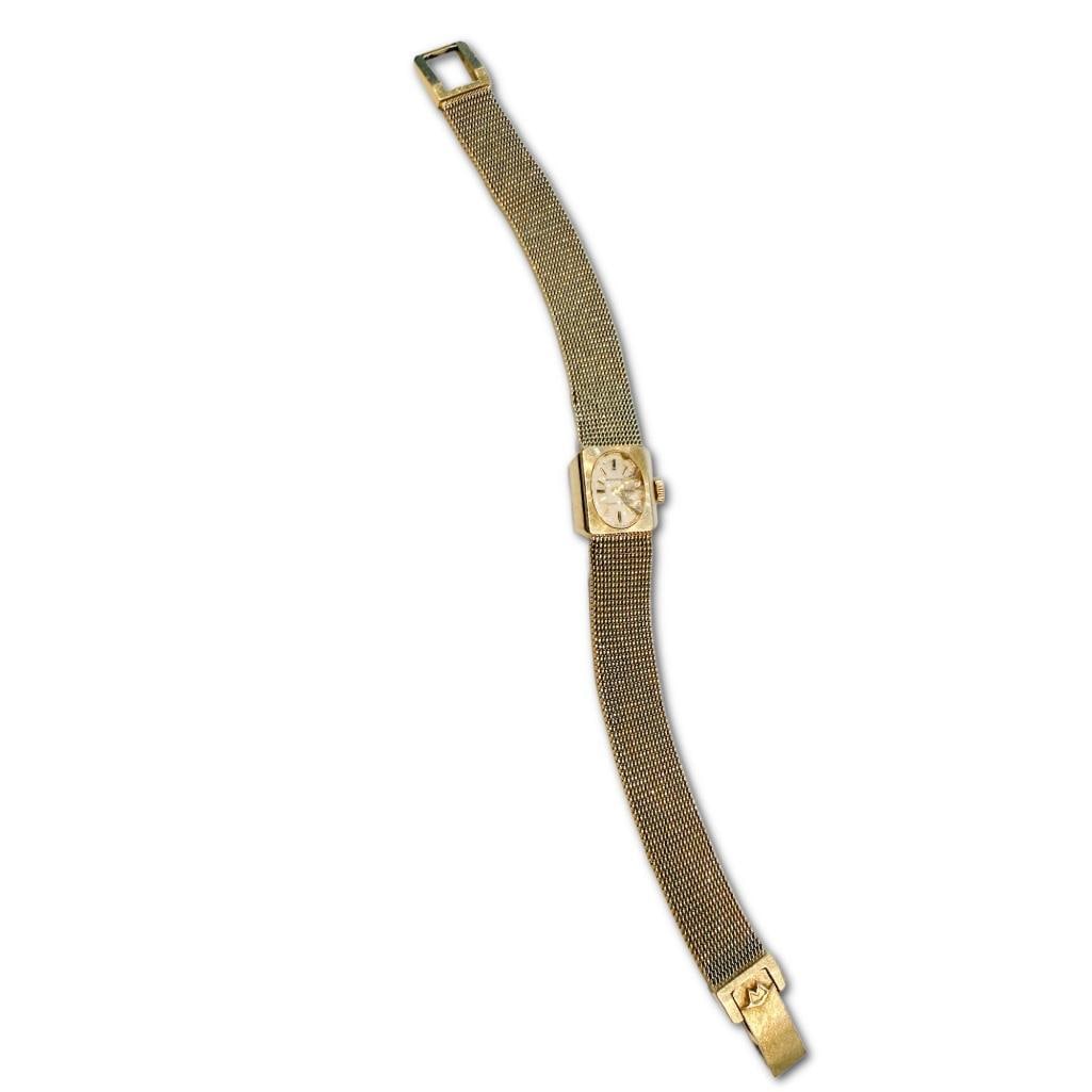 Ladies14k YG Movado for Tiffany & Co. Mesh Wrist Watch: Ladies14k Yellow Gold Movado for Tiffany & Co. Mesh Wrist Watch, Both Case and Band are Stamped 14k. The Watch Measures 6.75 inches in Length. The Watch Weighs 15.36dwt in Pennyweight Including W