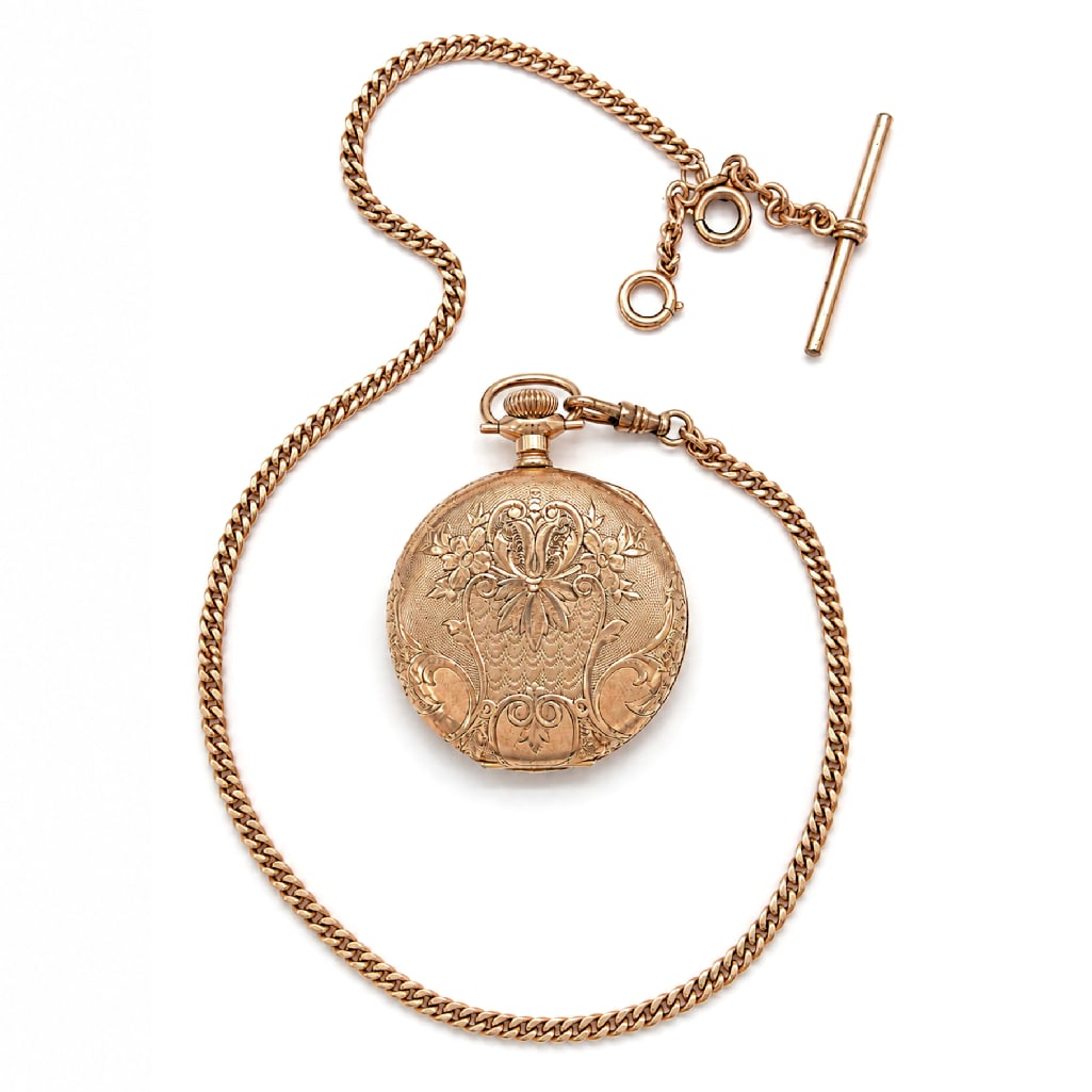 14k YG Ladies Elgin Pocket Watch with 10k Watch Fob.: 14k Yellow Gold Ladies Elgin Pocket Watch with 10k Watch Fob. The 17 Jewels Elgin Pocket Watch is Inscribed with Serial Number 577134 and Features Intricate Engravings and Floral Motifs.